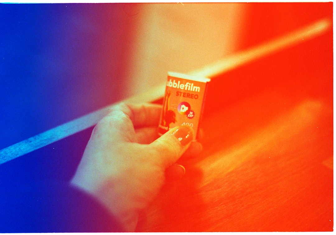 cta-bg hand-holding-a-small-roll-of-film-0bx9x-bwnso
